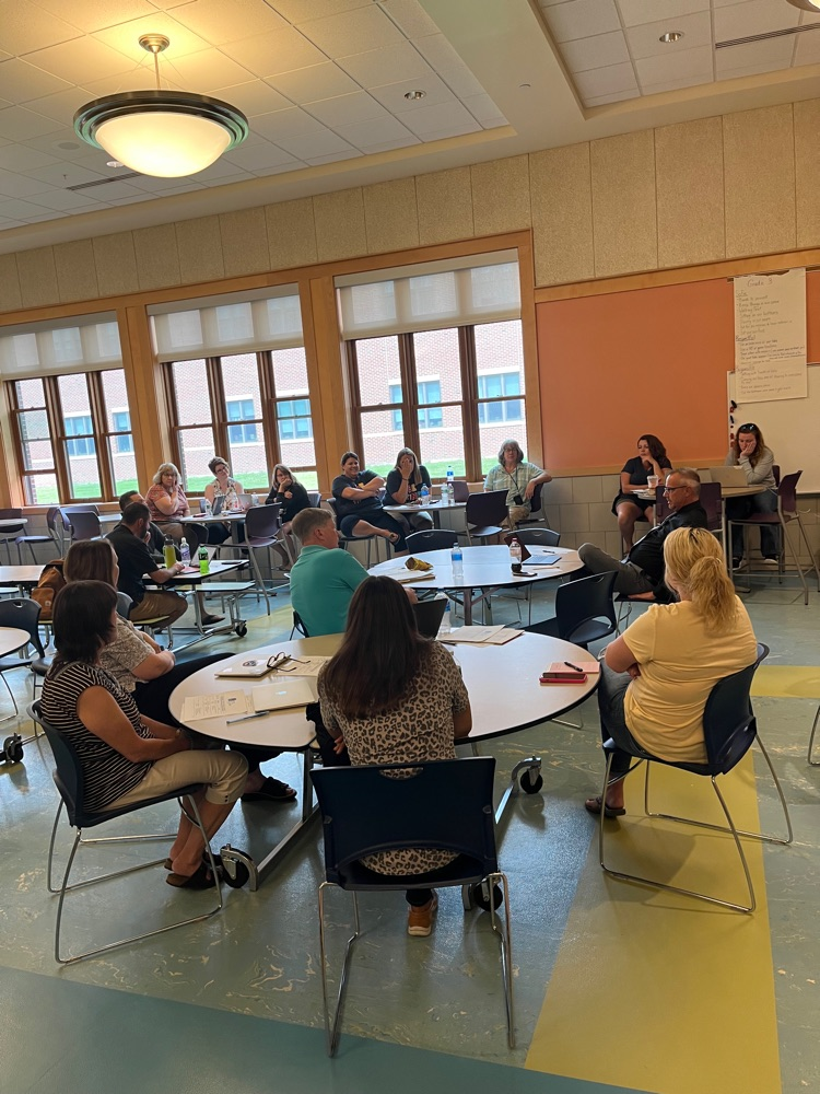 small group of teachers in a meeting